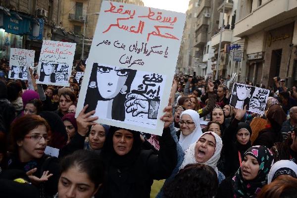 Women march in Cairo to protest violence