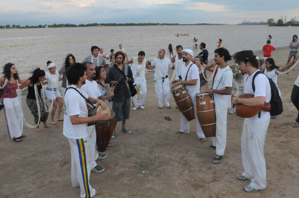 Immigrants pray for blessings from god of water