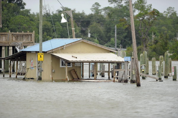 Isaac tops Louisiana levee on Katrina anniversary