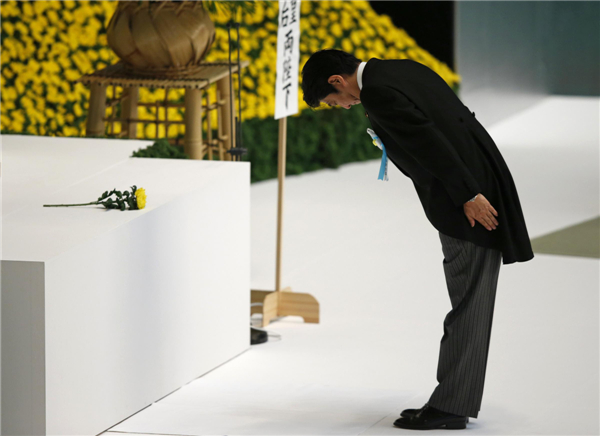 Japan's Abe sends offering to war shrine