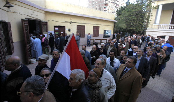 Egyptians begin voting on new constitution