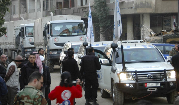 Aid truckloads enter Syria's besieged Homs