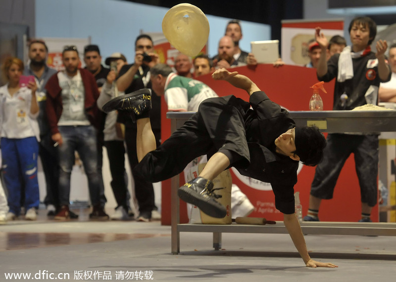 Bakers perform with dough in Pizza World Championships