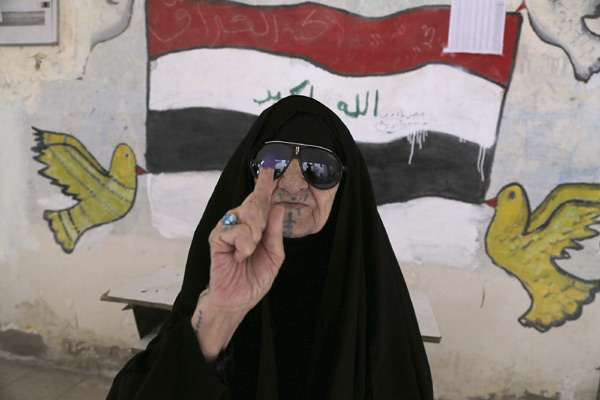 Iraqis begin to vote in parliamentary elections