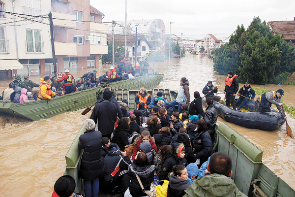 Serbians fortify riverbank as high water approaches