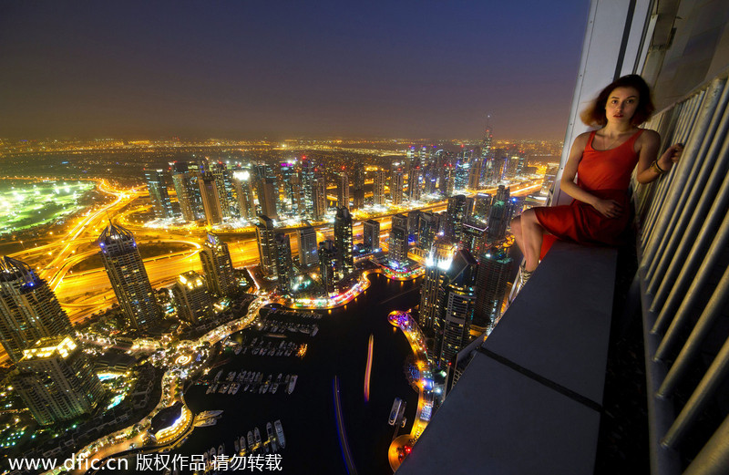 Daredevils taking selfie over Dubai skyscraper