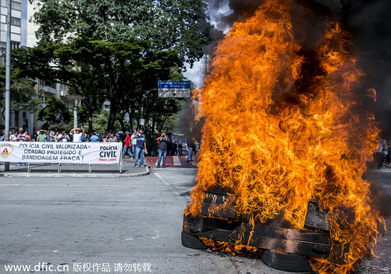 Brazilian police officers stage 24-hour strike ahead of World Cup