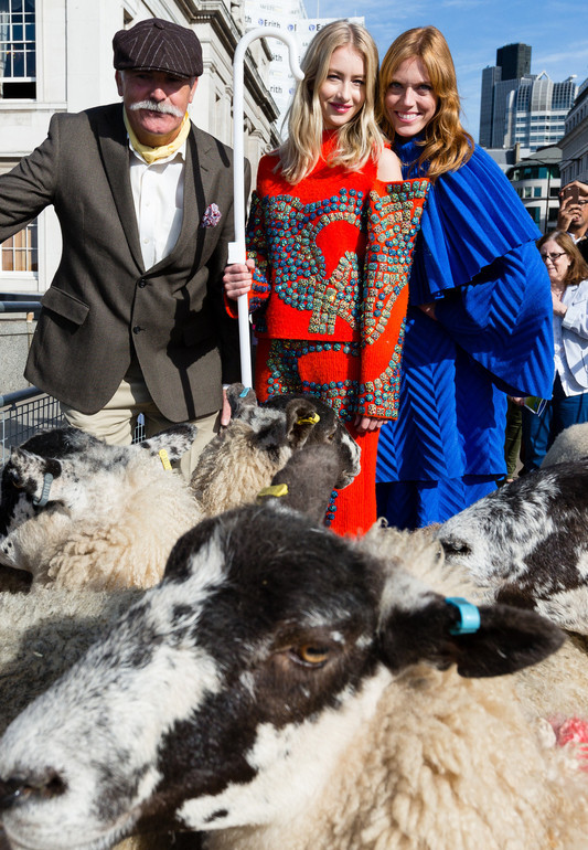 Liverymen and Freemen drive sheep crossing London Bridge