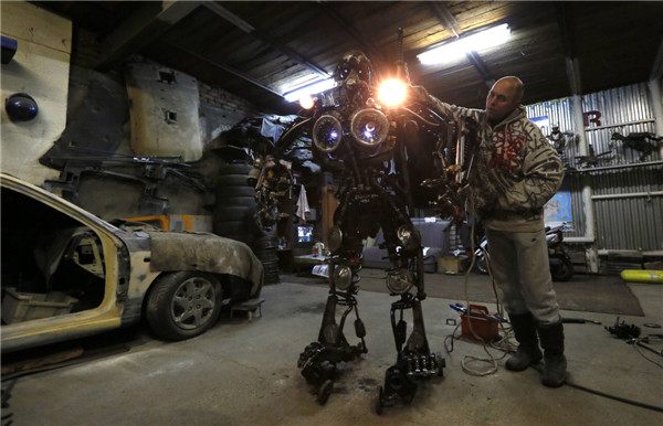 Mechanic creats mobile robots made of used car parts