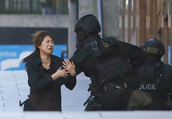 Live: Hostages held in Sydney cafe