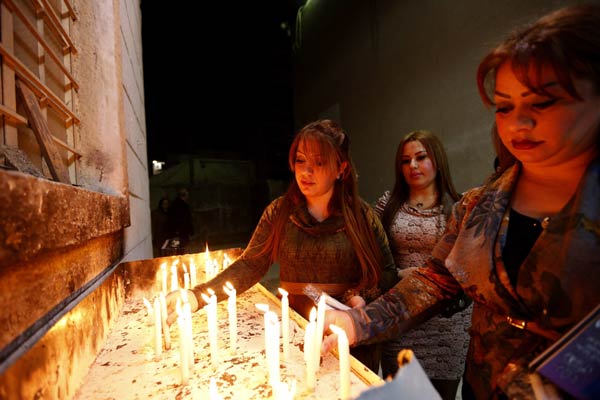 Baghdad's Christians gather defiantly for Christmas Eve mass