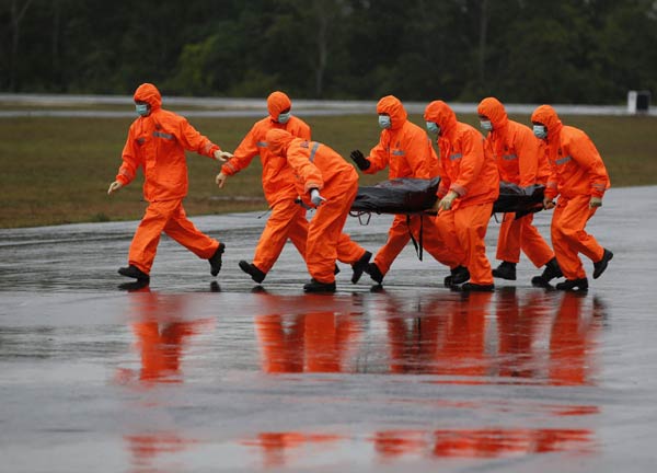 Australian experts help identify AirAsia victims