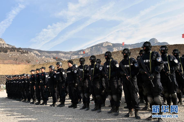 Riot police hone skills before heading for peacekeeping mission