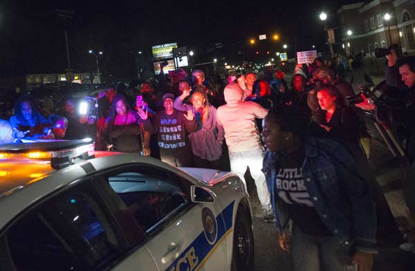 Two officers shot outside Ferguson police department