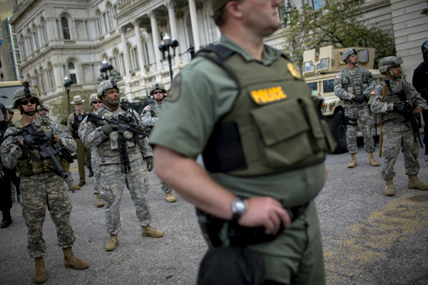 Marchers protest police violence in Baltimore, New York