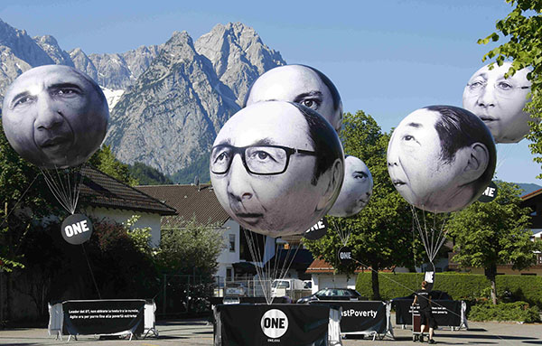 Protesters block road to G7 summit site