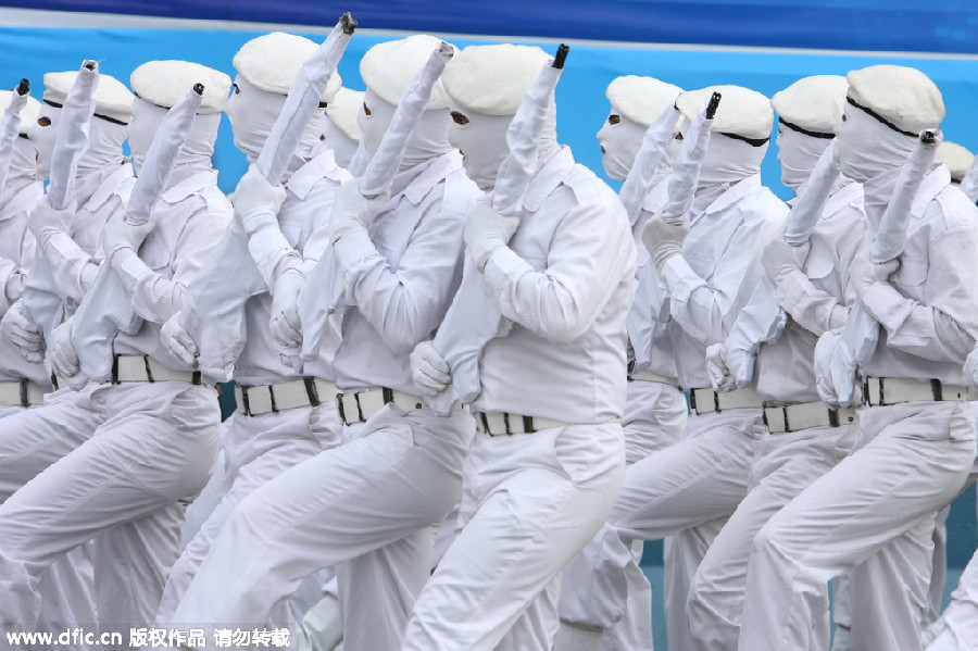 Camels, motorcycles and masks: Military parades in style