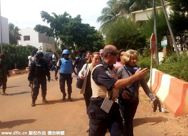 At least 27 dead after Islamists seize luxury hotel in Mali's capital