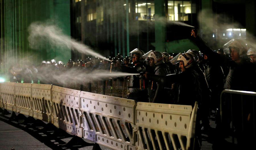 Supporters of Brazil's Rousseff clash with police as her removal looms