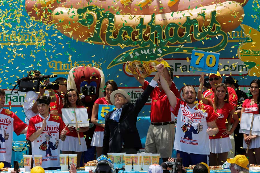 Hot dog-eating champ tastes victory again in US contest