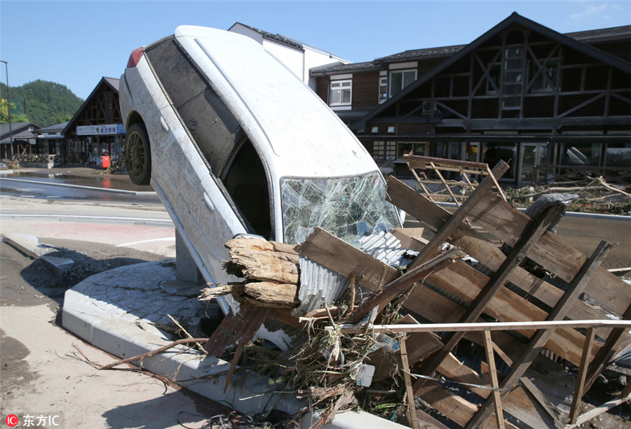 Typhoon kills 9 in Japan's old people's home as toll hits 11