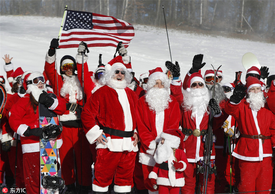 Santas ski for charity fund-raising in US