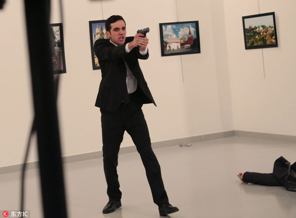 Russian ambassador shot dead in Turkey