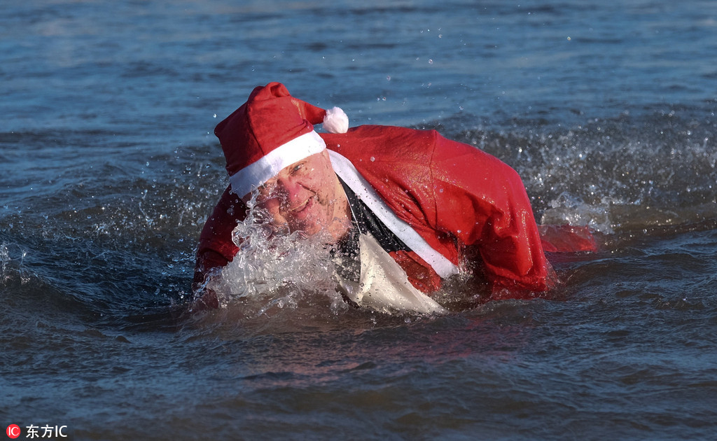 Boxing Day swimmers brave icy North Sea