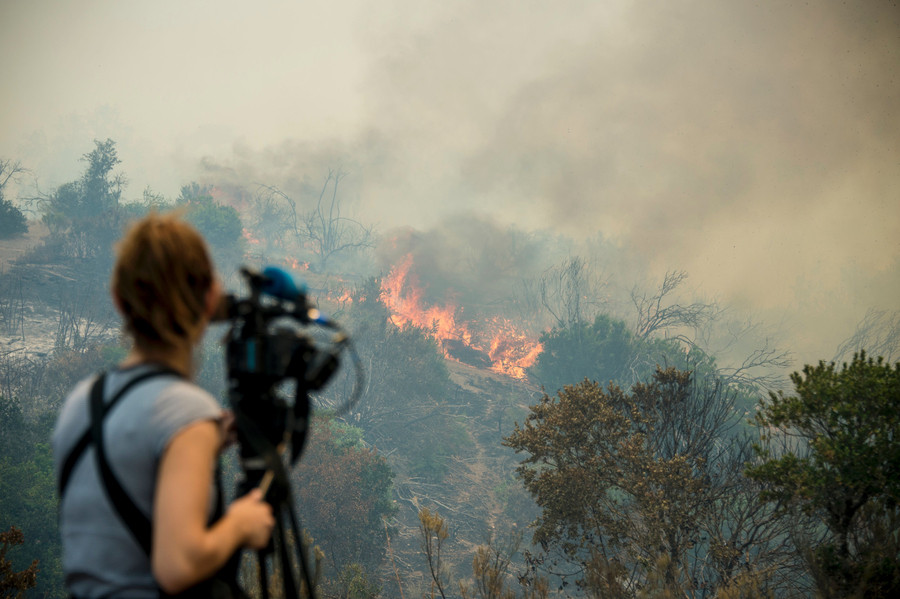 Chile battles devastating wildfires as international help pours in