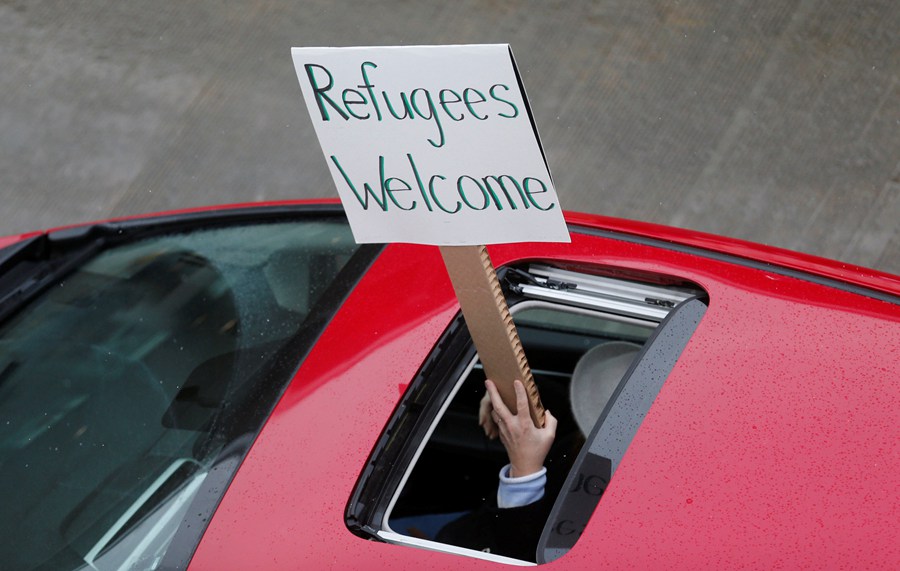 Trump's refugee ban sparks protests before White House, at over 30 US airports