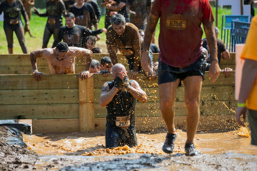 Israelis battle through miles of obstacles for 'Mud Day'