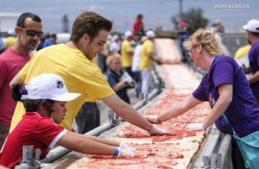 World's longest pizza breaks Guinness Records in US