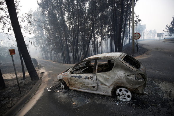 Death toll from forest fire raging in Portugal climbs to 62