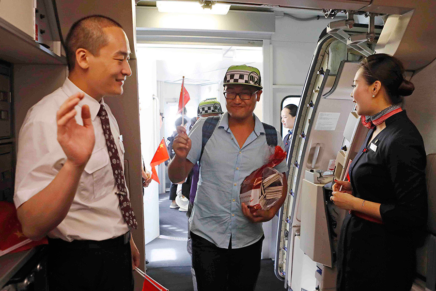 Chinese head home after hurricane