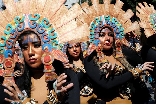 Day of Dead parade honors Mexican quake victims, rescuers