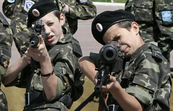 Ukrainian teenagers armed at military base